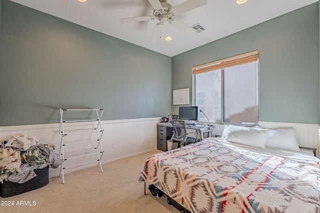 bedroom featuring ceiling fan and light colored carpet