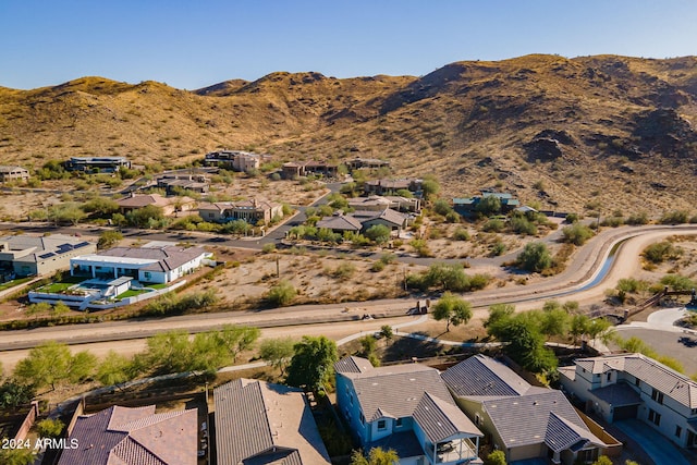 drone / aerial view featuring a mountain view