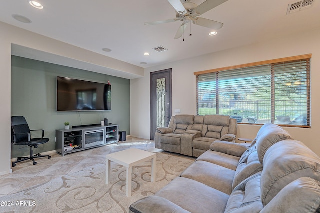 living room featuring ceiling fan