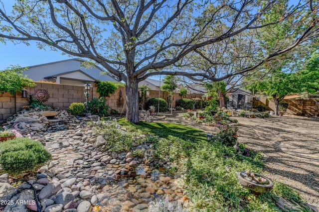5461 N Bremont Way, Prescott Valley, AZ 86314 - fenced backyard featuring a storage shed