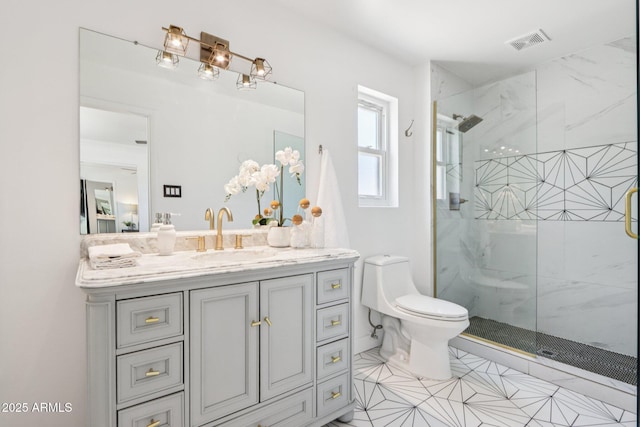 7049 E Latham St, Scottsdale, AZ 85257 - bathroom featuring vanity, a marble finish shower, and toilet