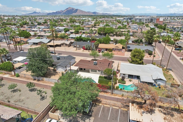 7049 E Latham St, Scottsdale, AZ 85257 - aerial perspective of suburban area featuring a pool and mountains