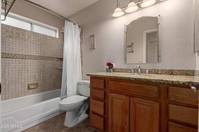 full bathroom with shower / tub combo with curtain, vanity, toilet, and tile patterned flooring