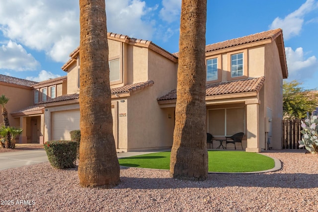 view of front of property featuring a garage