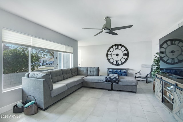 living room featuring ceiling fan