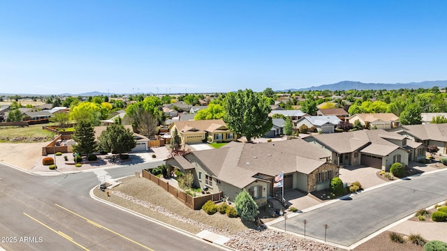 aerial perspective of suburban area with a mountain backdrop