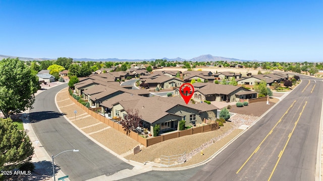 aerial perspective of suburban area with a mountainous background