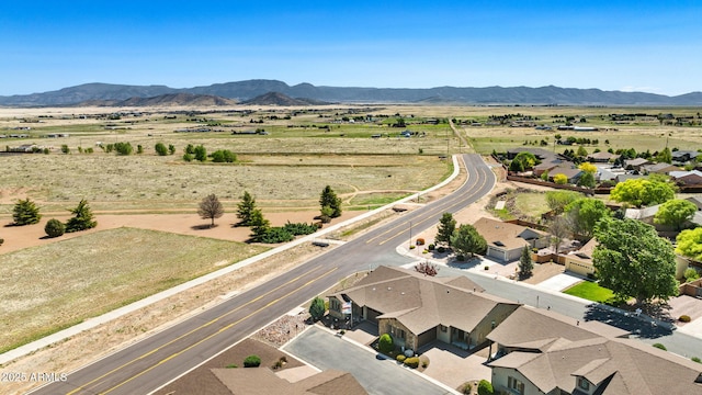 overview of rural landscape featuring mountains and nearby suburban area