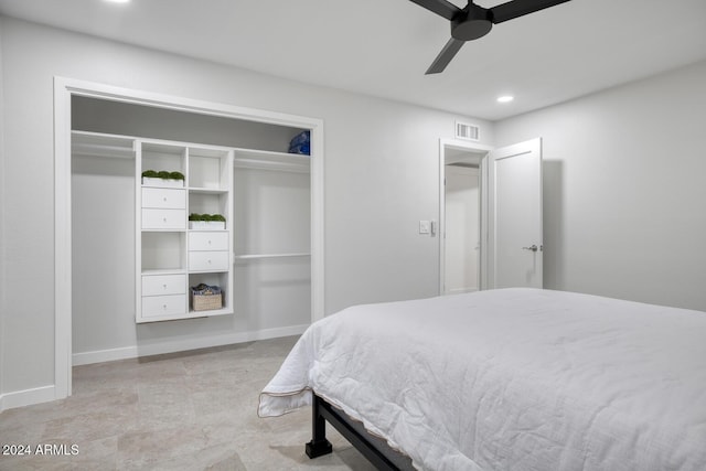 bedroom featuring ceiling fan and a closet