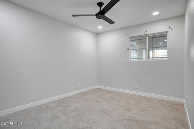 spare room featuring ceiling fan