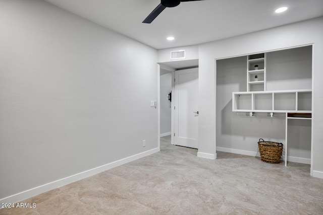 unfurnished bedroom with a closet and ceiling fan