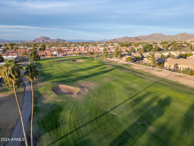 surrounding community with a mountain view