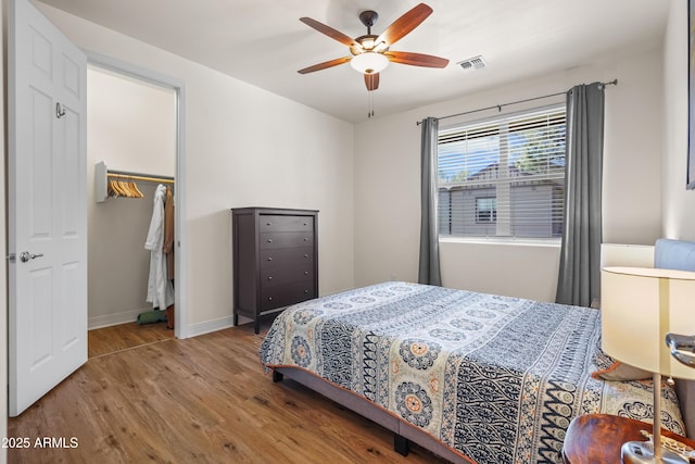 2470 W Clement Cir, Flagstaff, AZ 86001 - bedroom with wood finished floors and ceiling fan