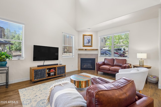 2470 W Clement Cir, Flagstaff, AZ 86001 - living room with wood finished floors and a tile fireplace