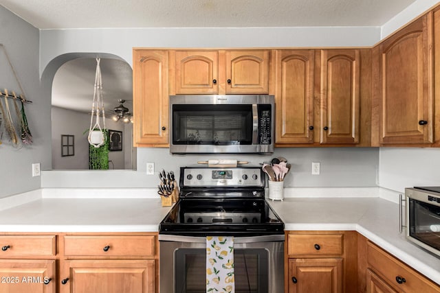 13359 W Post Dr, Surprise, AZ 85374 - kitchen featuring appliances with stainless steel finishes and light countertops