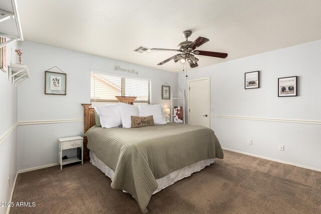 13359 W Post Dr, Surprise, AZ 85374 - carpeted bedroom with a ceiling fan and baseboards