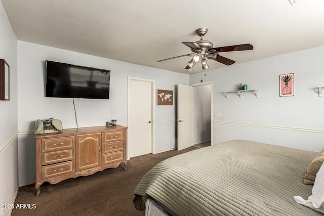 13359 W Post Dr, Surprise, AZ 85374 - bedroom with dark carpet and a ceiling fan