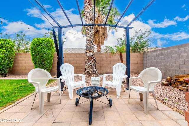 13359 W Post Dr, Surprise, AZ 85374 - view of patio with a fire pit and a fenced backyard