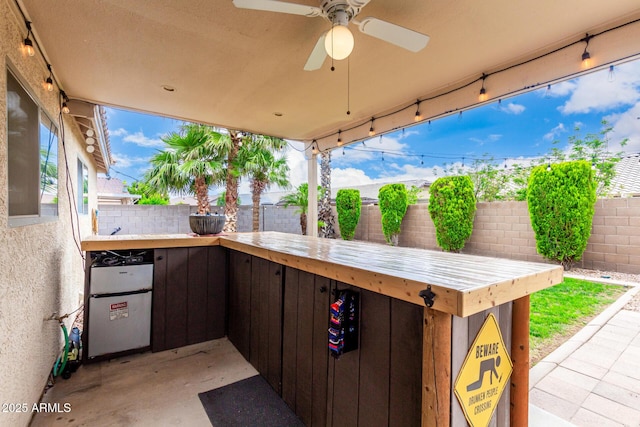 13359 W Post Dr, Surprise, AZ 85374 - view of patio with a fenced backyard and a ceiling fan