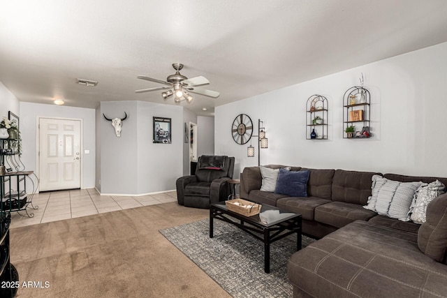 13359 W Post Dr, Surprise, AZ 85374 - carpeted living room featuring a ceiling fan and tile patterned floors