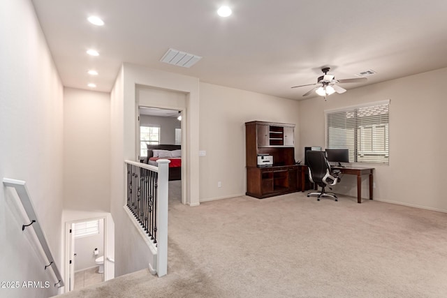 office area featuring carpet flooring, recessed lighting, visible vents, and baseboards