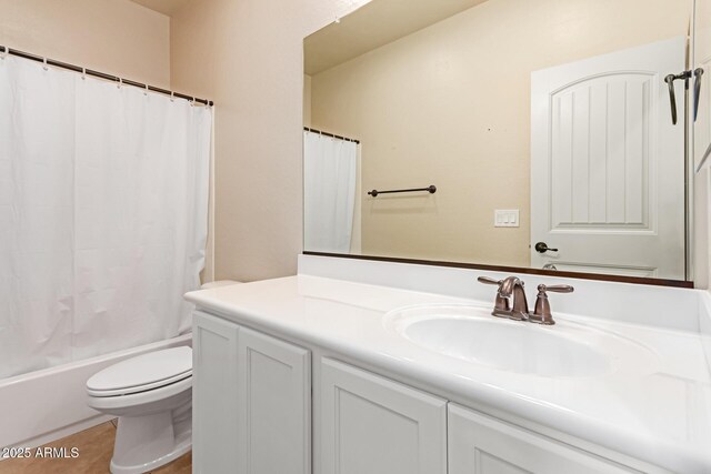 bathroom featuring tile patterned flooring, toilet, vanity, and shower / tub combo