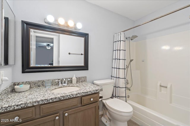 bathroom featuring vanity, toilet, and shower / bath combo with shower curtain