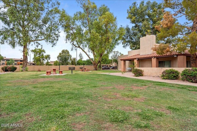 view of yard with fence
