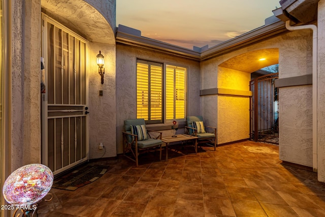 view of patio terrace at dusk