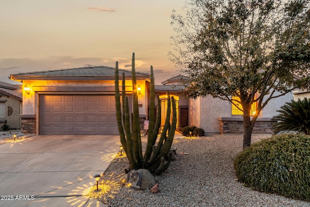 view of front of home with a garage