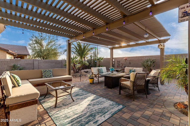 view of patio / terrace featuring a pergola and an outdoor living space with a fire pit