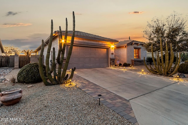 view of front of property featuring a garage