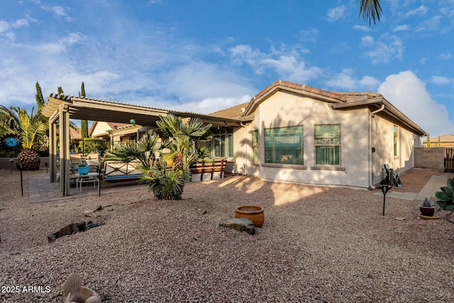 back of house featuring a patio and a pergola