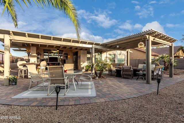 view of patio featuring an outdoor hangout area, exterior bar, and a pergola