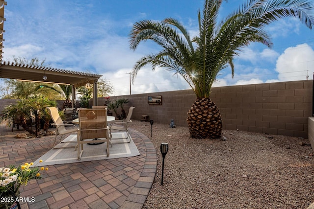 view of patio featuring a pergola