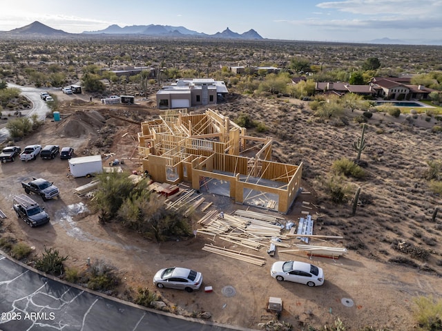 drone / aerial view featuring a mountain view