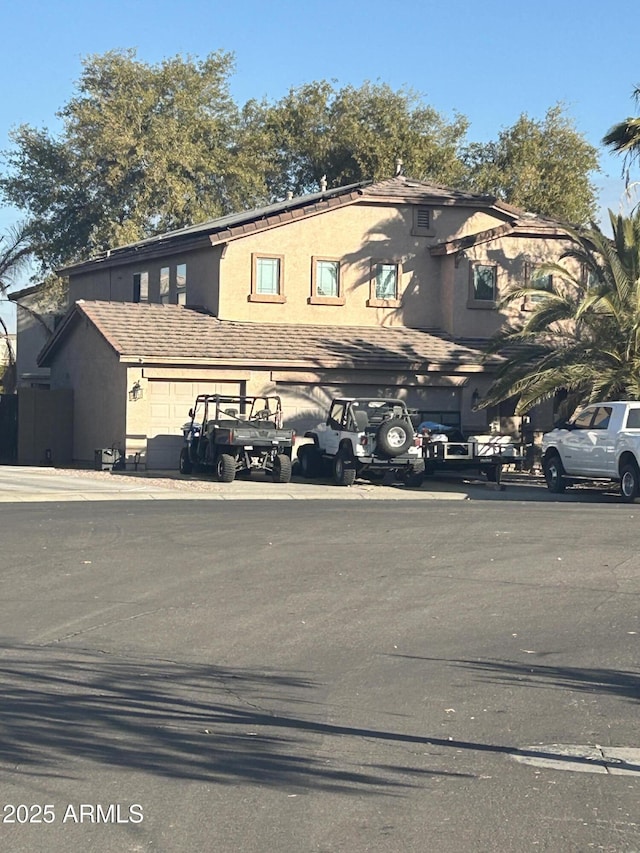 view of property with a garage