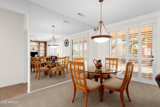 22622 N Mazatlan Dr, Sun City West, AZ 85375 - dining area featuring carpet and visible vents