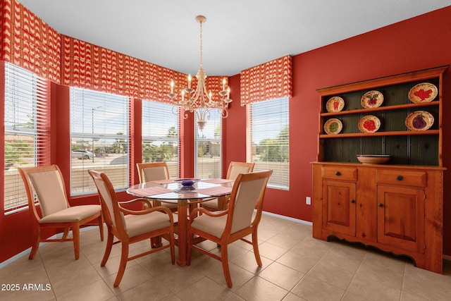22622 N Mazatlan Dr, Sun City West, AZ 85375 - dining room featuring baseboards, light tile patterned floors, and a chandelier