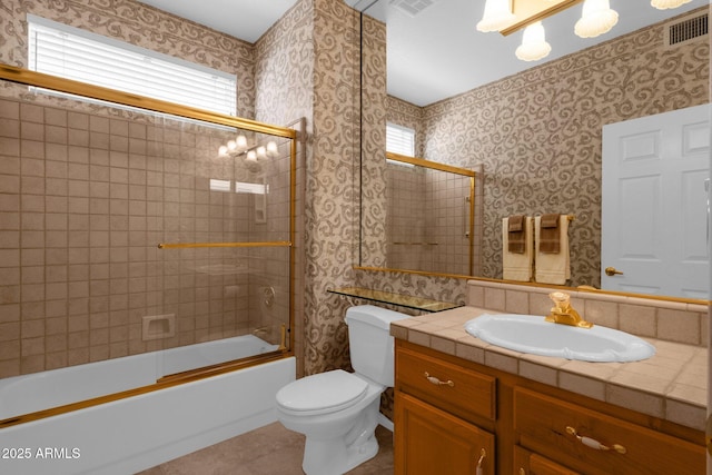 22622 N Mazatlan Dr, Sun City West, AZ 85375 - bathroom with a wealth of natural light, toilet, wallpapered walls, and visible vents