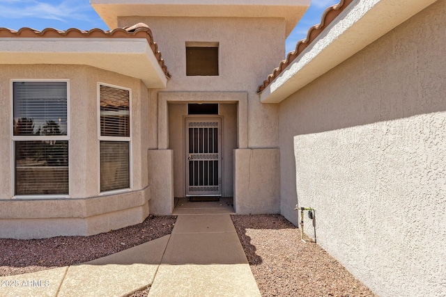 22622 N Mazatlan Dr, Sun City West, AZ 85375 - entrance to property with stucco siding and a tiled roof