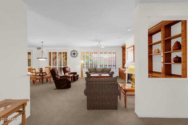 22622 N Mazatlan Dr, Sun City West, AZ 85375 - carpeted living area with a ceiling fan