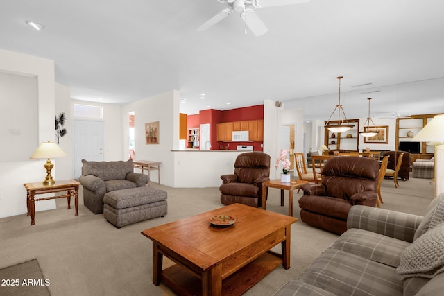 22622 N Mazatlan Dr, Sun City West, AZ 85375 - living room with ceiling fan, recessed lighting, and light colored carpet