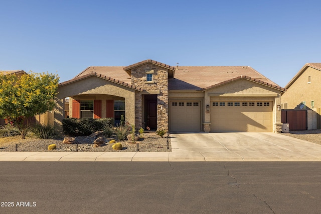 view of front of property with a garage