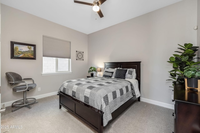 bedroom with light colored carpet and ceiling fan