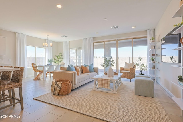 living room featuring an inviting chandelier