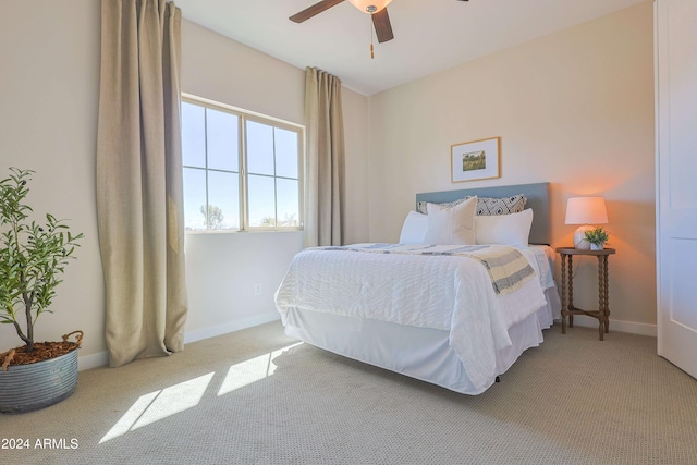 bedroom featuring ceiling fan and carpet floors