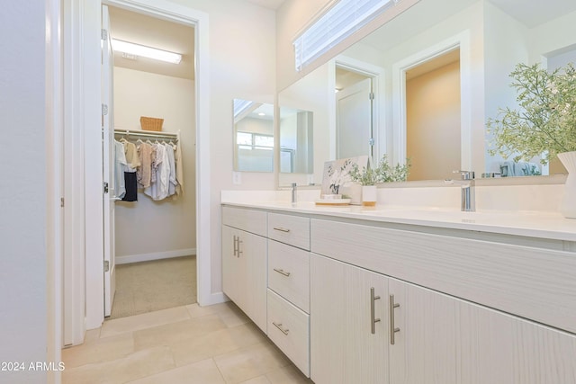 bathroom featuring vanity and tile patterned floors