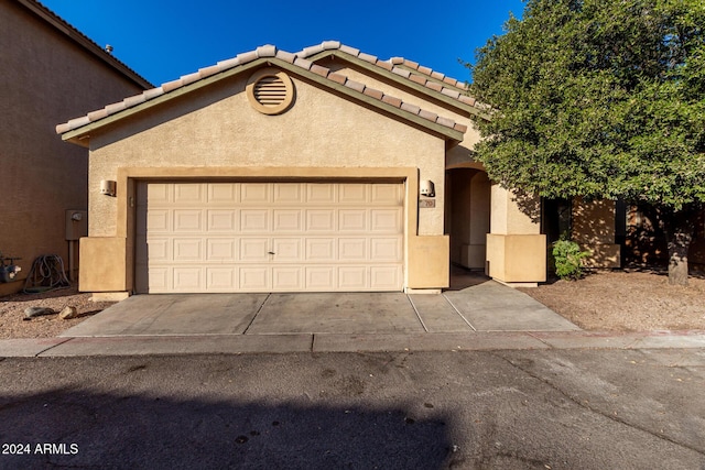 view of front of home with a garage