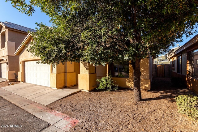 exterior space featuring a garage